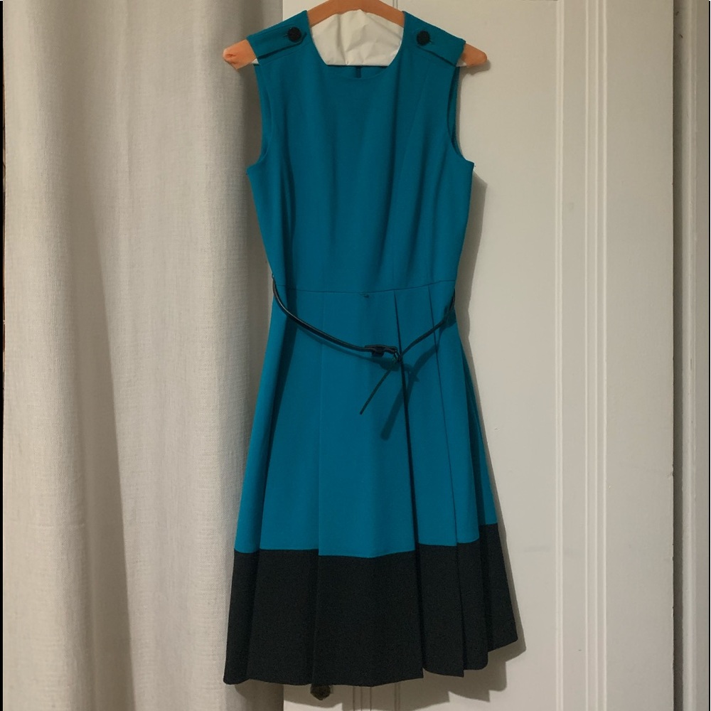 Midi Dress with pleats in the front.